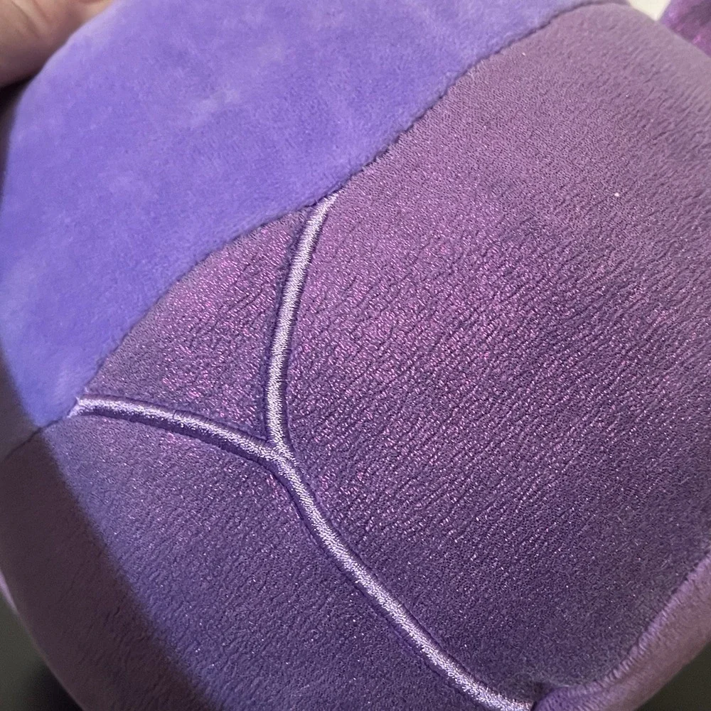 Squishmallows axel purple